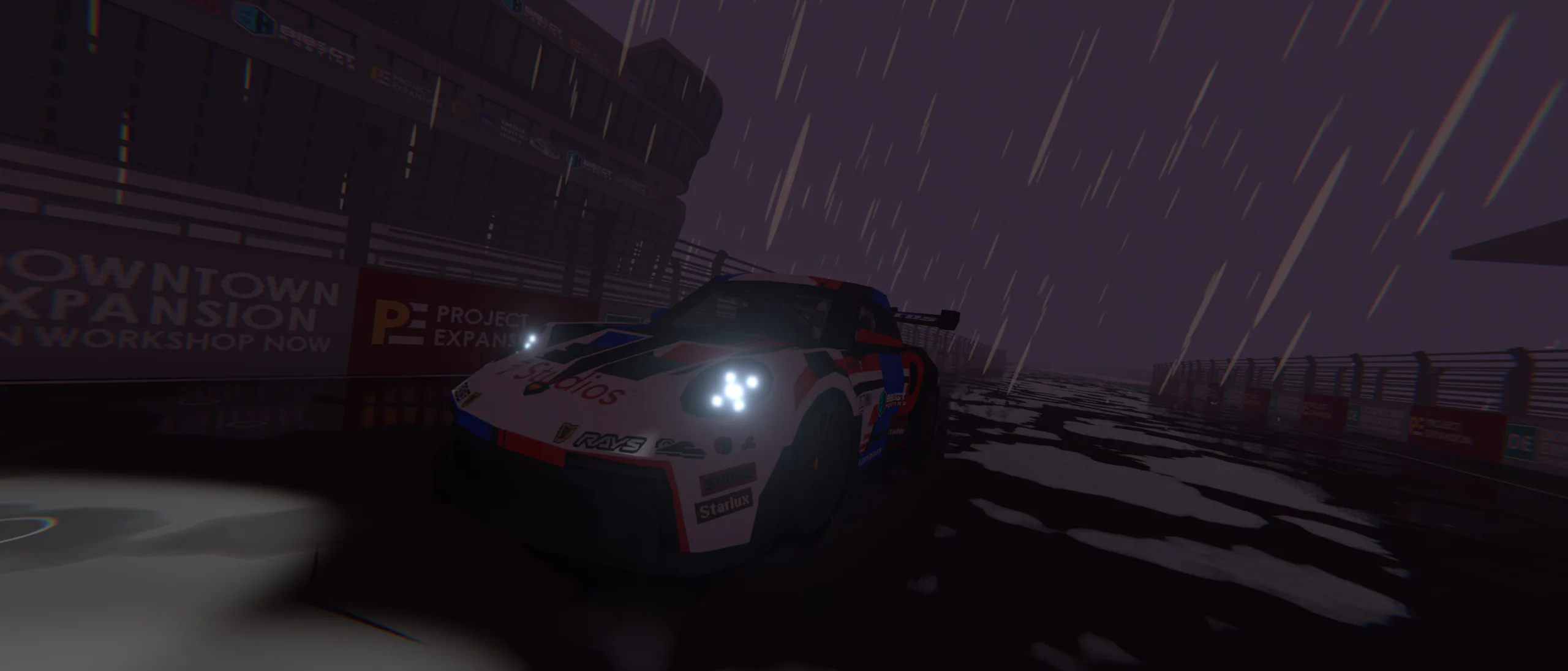 Night street race: a liveried sports car cornering on a wet track under floodlights