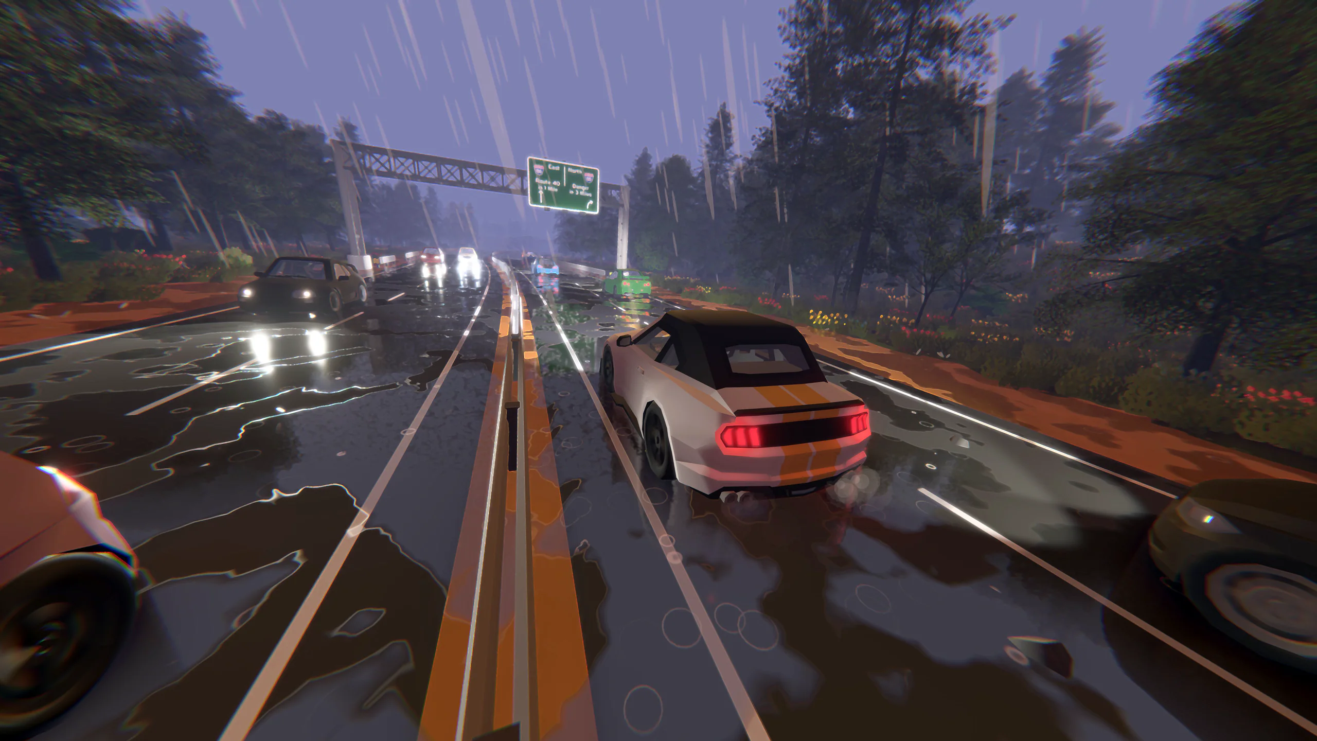 Night race under an overpass: two cars battling on a wet road past a green highway sign